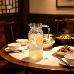 BY-9148 unbreakable PC water pitcher - on a restaurant table