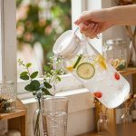 BY-9145B unbreakable PC water pitcher - being poured by hand