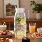 BY-9142A unbreakable PC water pitcher - set on a dining table for dinner