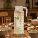 BY-9143 unbreakable PC water pitcher - set on a dining table for dinner