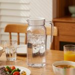 BY-9144A unbreakable PC water pitcher - set on a dining table for dinner