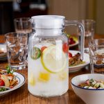 BY-9145D unbreakable PC water pitcher - set on a dining table for dinner