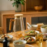 BY-9183B unbreakable PC full-handle water pitcher (tea) - set on a dining table for dinner