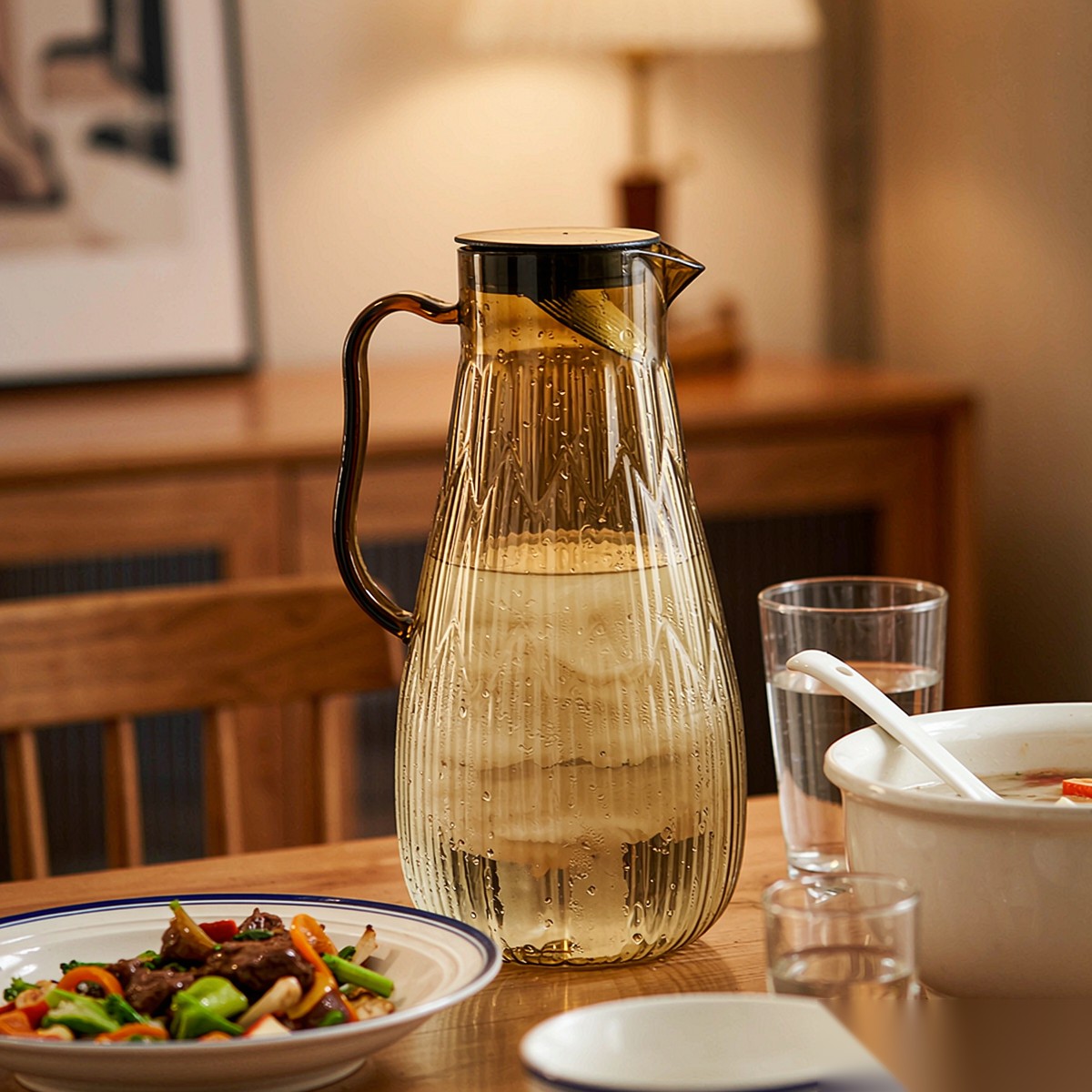 BY-9193A unbreakable PC full-handle water pitcher (tea) - set on a dining table for dinner