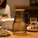 BY-9193B unbreakable PC full-handle water pitcher (tea) - set on a dining table for dinner