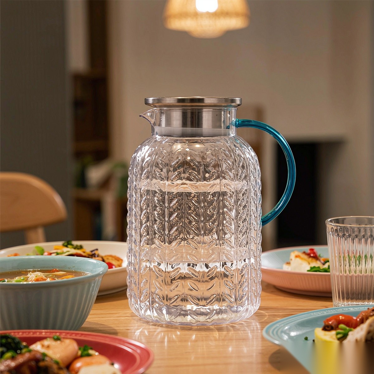 BY-9196A unbreakable PC full-handle water pitcher (steel) - set on a dining table for dinner