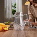 BY-9197C unbreakable PC full-handle water pitcher (steel) - set on a dining table for dinner