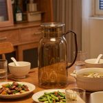 BY-9198B unbreakable PC full-handle water pitcher (tea) - set on a dining table for dinner