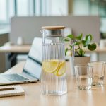 BY-9160B-1 unbreakable PC stainless steel handle water pitcher (wood) - in an office meeting room