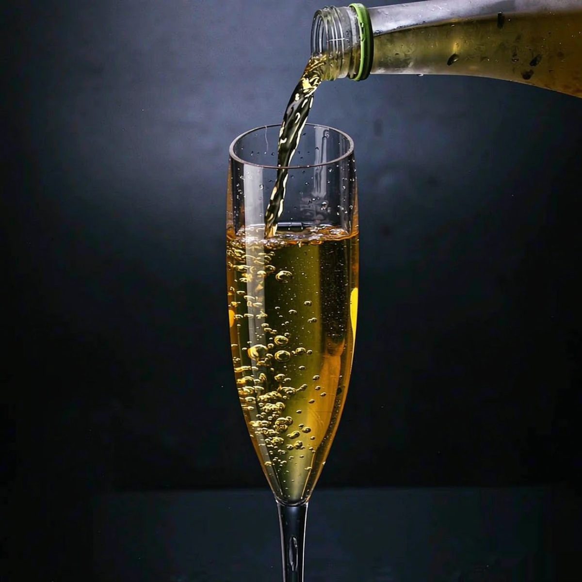BY-9916-1 PC champagne flute in pouring action shot