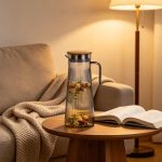 BY-9160A-1 unbreakable PC stainless steel handle water pitcher - beside a reading nook