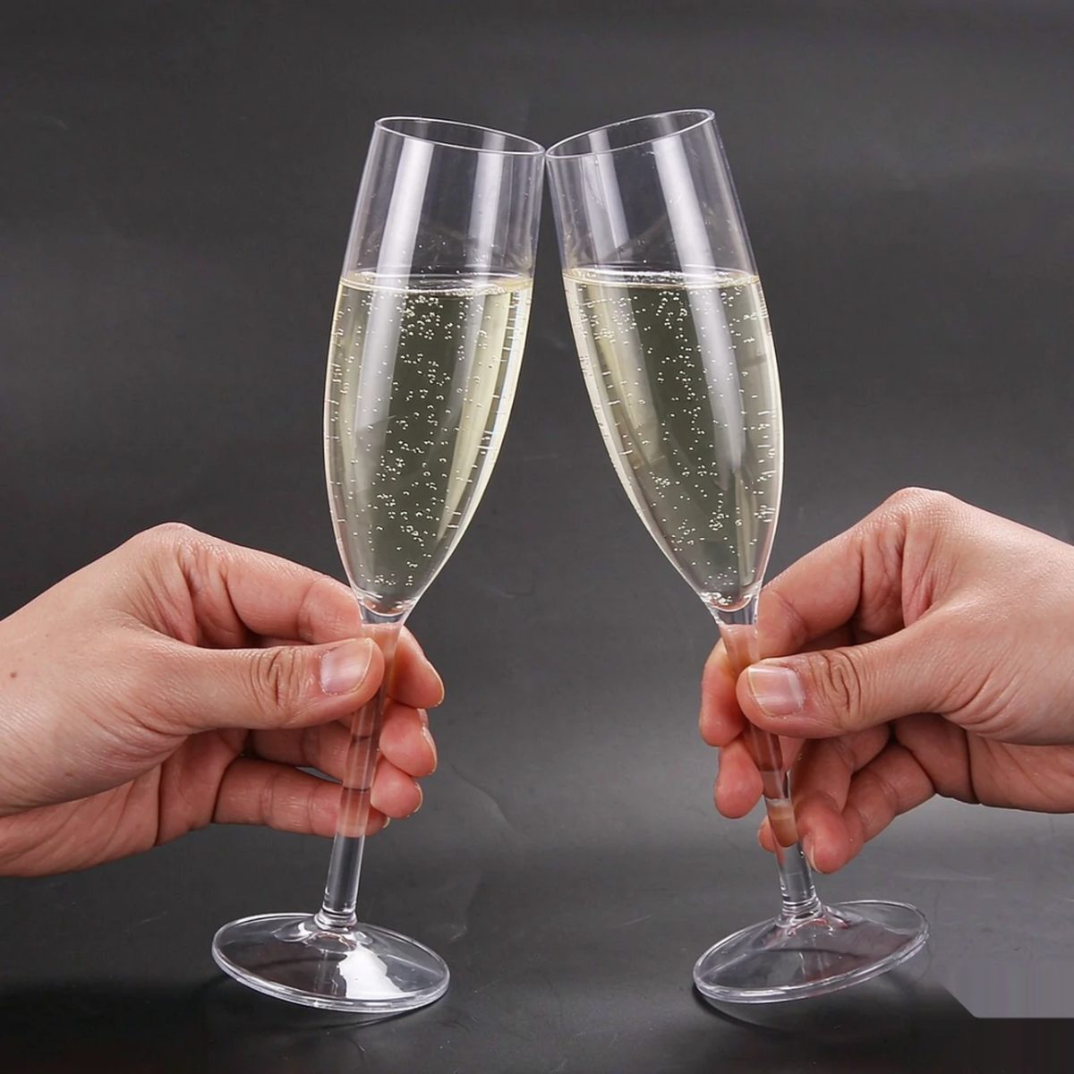 BY-9916 PC champagne flute in handheld toasting