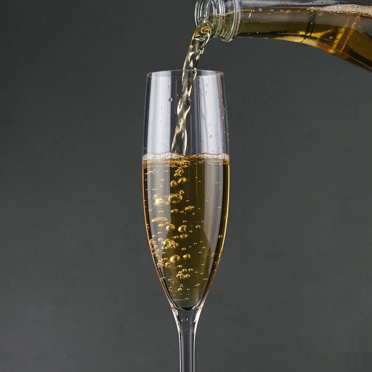 BY-9916 PC champagne flute in pouring action shot